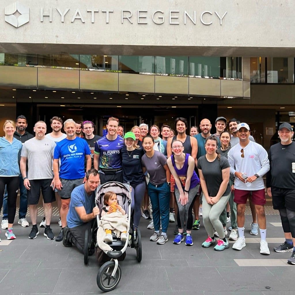 Cinder Run Club group photo outside the Hyatt Regency San Francisco